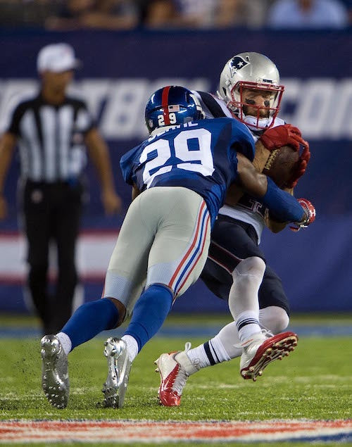 Nat Berhe #29 tackle vs New England Patriots